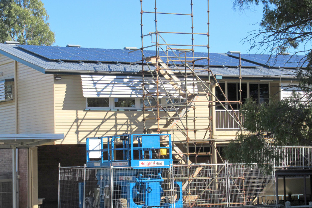 Work underway as part of the Advancing Clean Energy Schools Program with solar panels being installed.