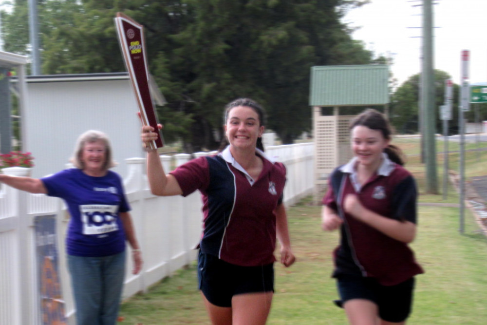 Reagan in full flight carrying the Rotary Centenary Banner on its journey through Allora in March this year.