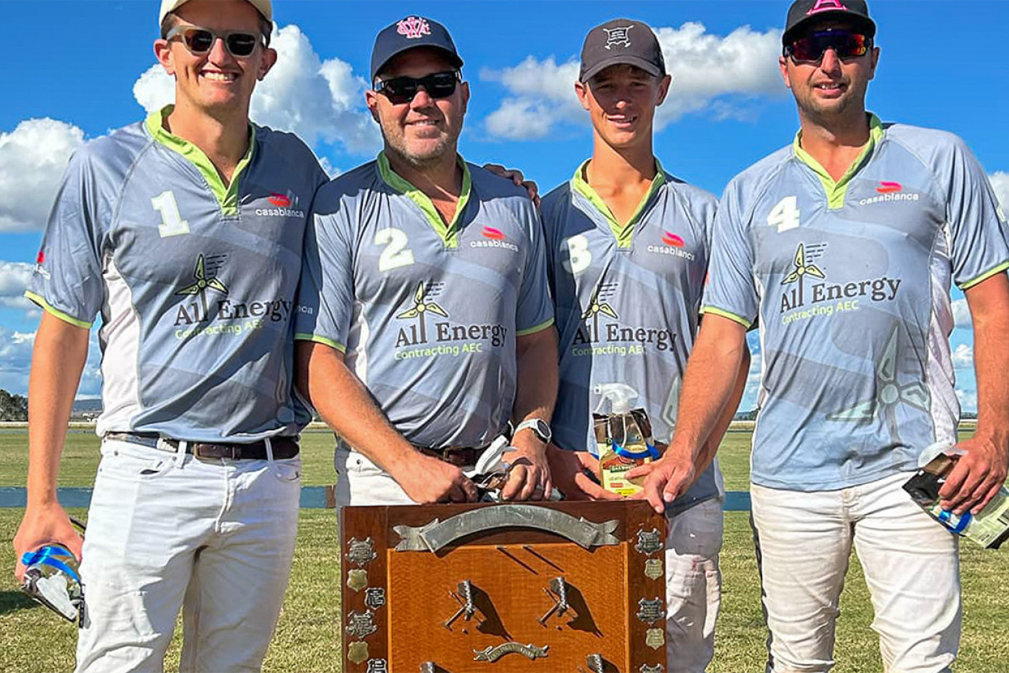 A Grade Eagers Shield Winners: Visiting side AEC lift historic Eagers Shield. From left: Curtis Winwood, Steve Urquhart, James Reid and Nick Keyte.