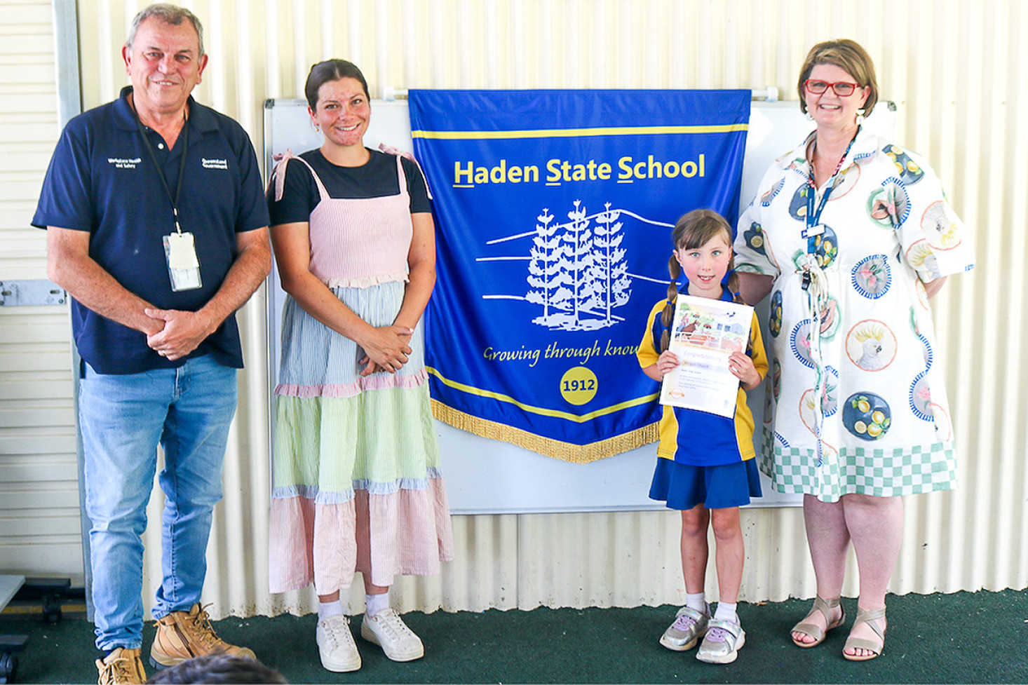 Haden State School student Abigail Church’s (second from right) entry made this year’s Queensland Farm Safety calendar.