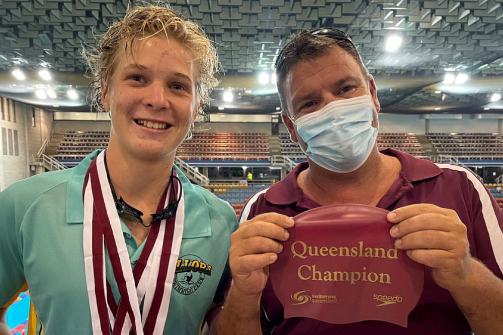 Bailey Harm and Coach Andrew Fidge celebrate a successful outing at the QLD Sprint Championships.