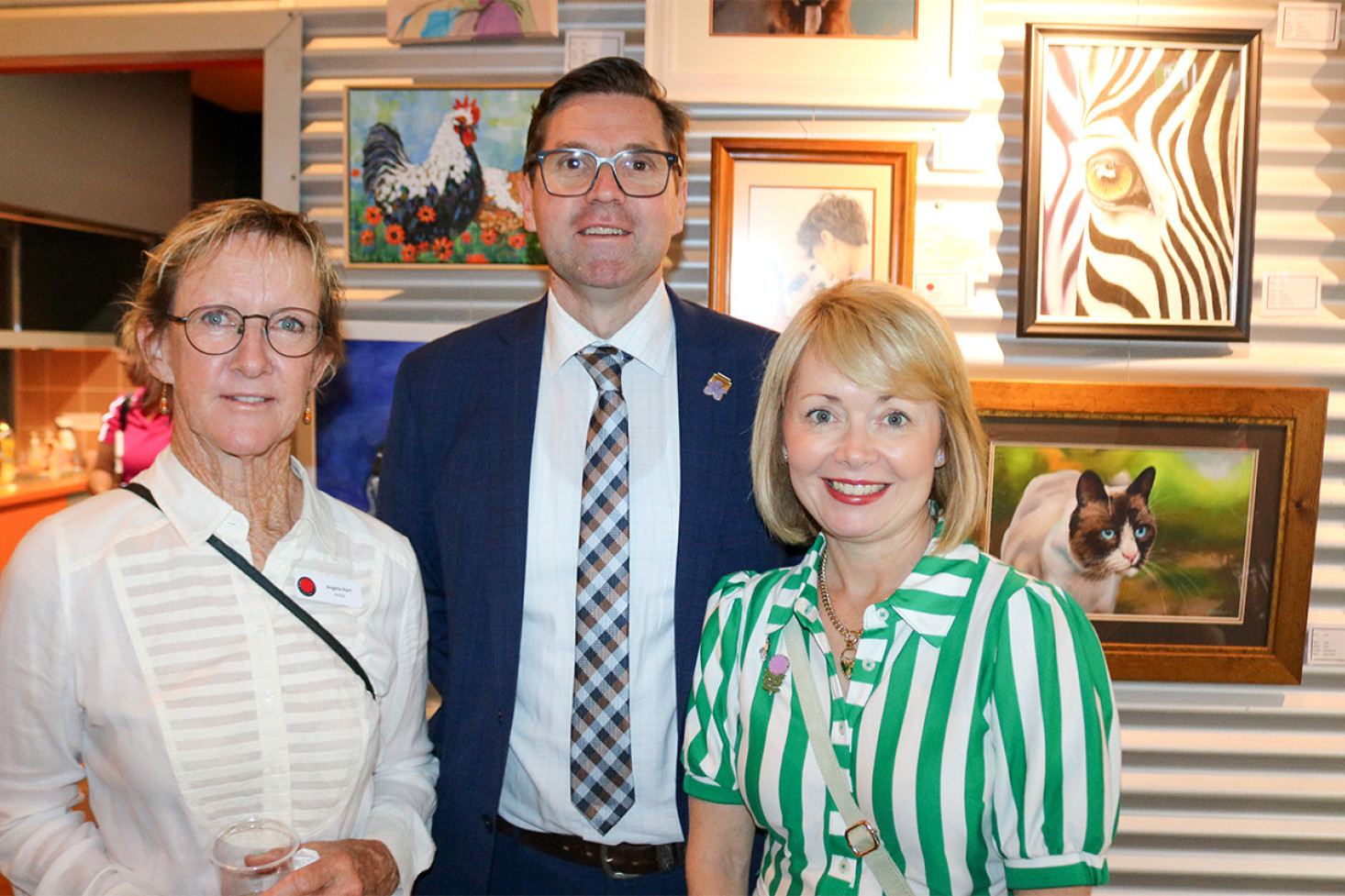 Among the dignitaries who attended the official opening of Country Week, held in conjunction with the annual Art Show, were the Mayor of the Toowoomba Region, Geoff McDonald and his wife Lisa, who took the opportunity to chat with Back Roads Artist Angela Hart (left).