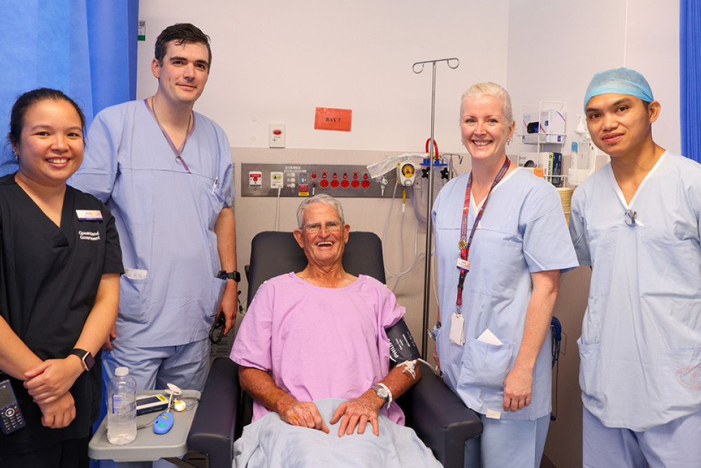 The first angiogram patient at Toowoomba Hospital, Ken with some of the treating team Alanea Espiritu, Dr Robert Gluer, Kirsten Douglas-Robinson and Joe Senagan