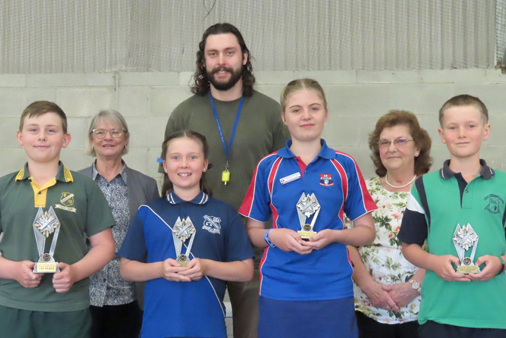 The judges, back from left: Rita Davis, Sam Craig and Bernie Trimingham. The winners, from left: Sam, Annabelle, Georgie and Andrew.