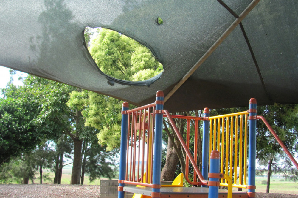 At Barton Park, vandals tore a large hole in the shade sail above the playground