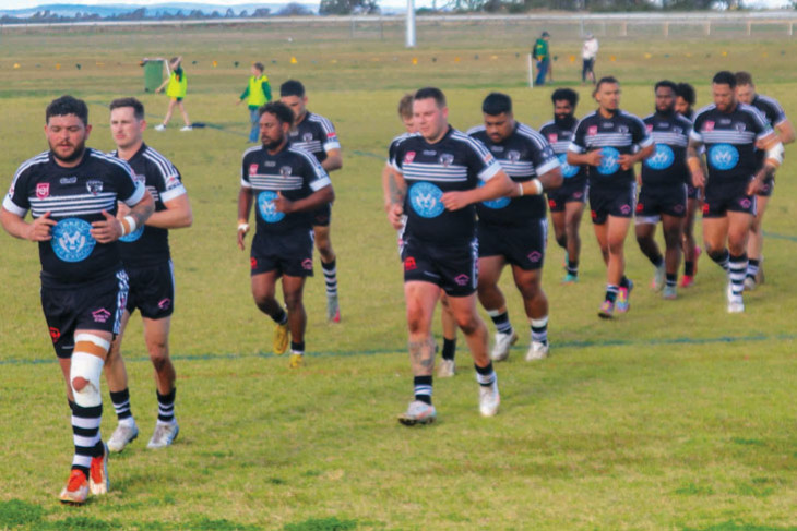 Bears Captain/coach Ash Taylor leads his side off Platz Oval at half time.