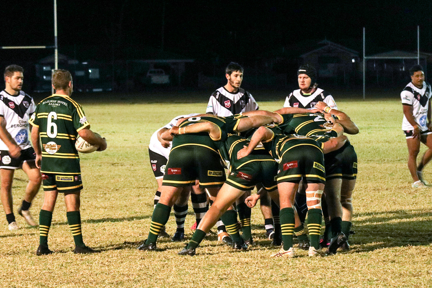 ABOVE: The reserves players pack a scrum.