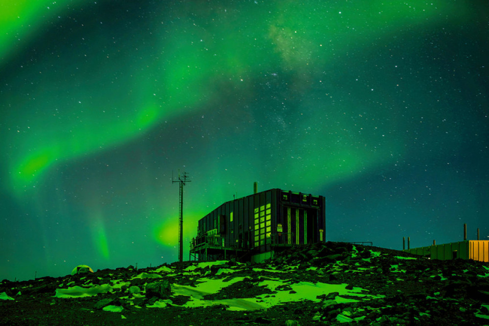 The BOM calendar’s December page features the lights of Aurora Australis over the Davis Station meteorological office in Antarctica, the photograph taken by Barry Becker.