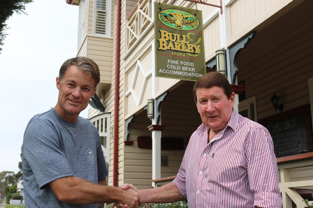 The new owner of the Bull & Barley Inn Mick Dewar is congratulated by outgoing proprietor Bruce Dell.