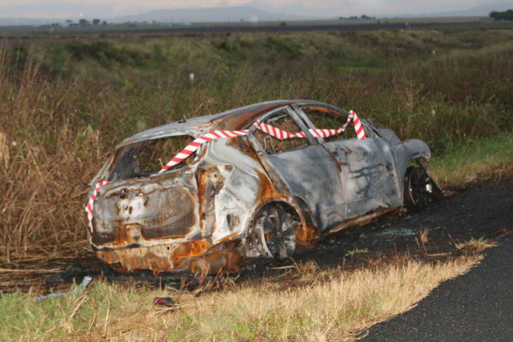 A burnt out hatchback just west of Nobby.