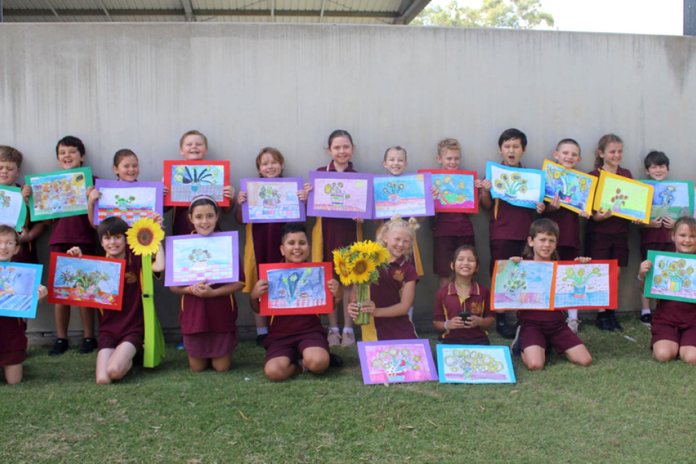 Year 4 students and their amazing sunflower drawings.