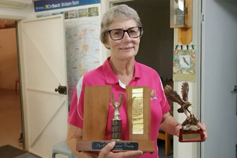 Carol Browne with the Vic Noll Memorial Trophy.