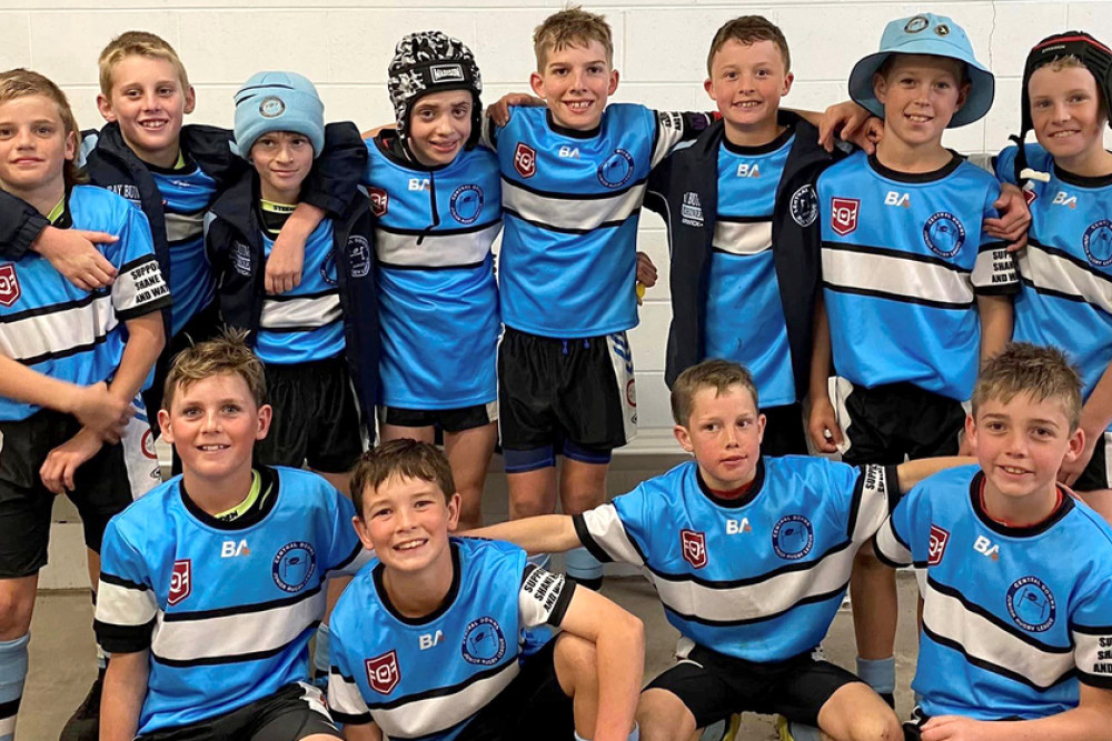 The very enthusiastic Wattles Junior Rugby League Club contingent that were members of the Central Downs team who contested the recent Zone 5 Under 43 kg JRL Carnival at Wynnum - Back: Levi Zadow, Cooper Zadow, Lincoln Cooper, Archie Joppich, Jed Hinz, Jake Burns, Tom Patterson, Mick Willett. Front:\_Tom Peters, Jackson McMillan , Dustyn May & Adam Butler. (image courtesy Tabitha Peters)