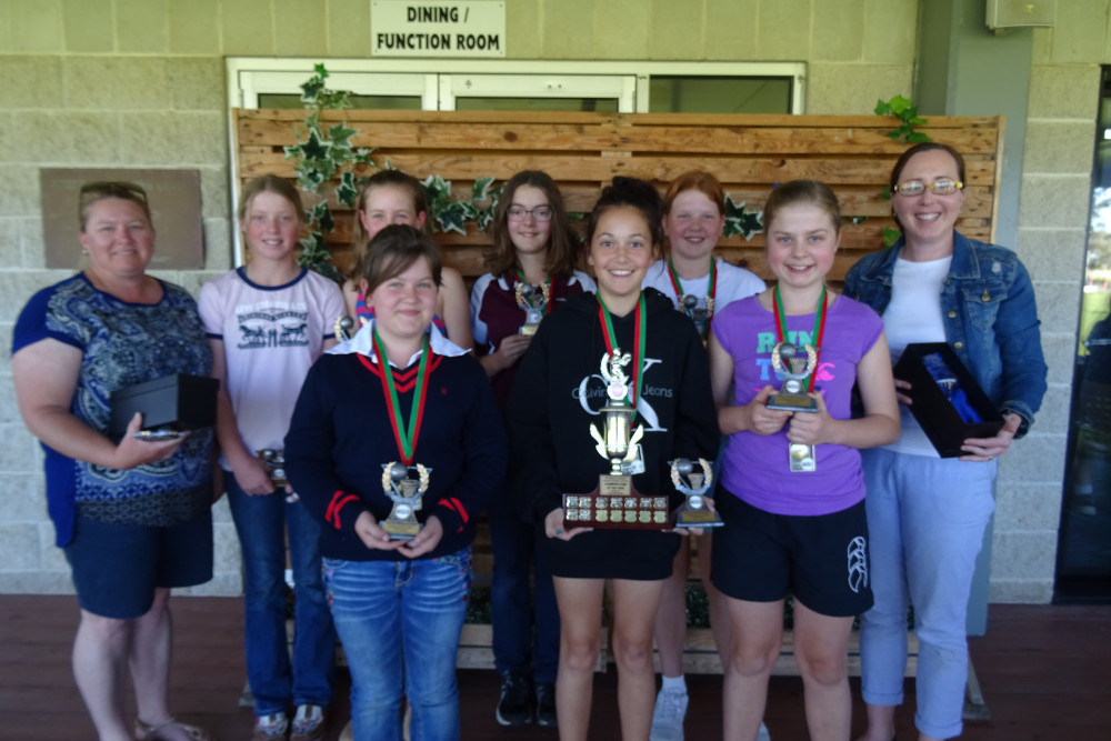 Champion Team 12B Tigers. Back row from left are Melissa Duncombe (manager), Isabelle Duncombe, Gabrielle Drew, Hayley Norman and Eden Price. Front row from left are Ella Lewis, Erykah McElheran, Jasmine Perkins, Fiona Drew (coach). Absent was Renee Hobbs.