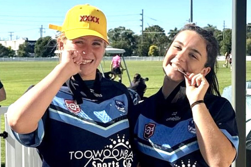 Recently announced Queensland Country rugby league representatives Chelsea Middleton and Reagan McMillan celebrating winning the 2025 QRL 47th Battalion Carnival in Bundaberg in June. Photo, Alana McMillan