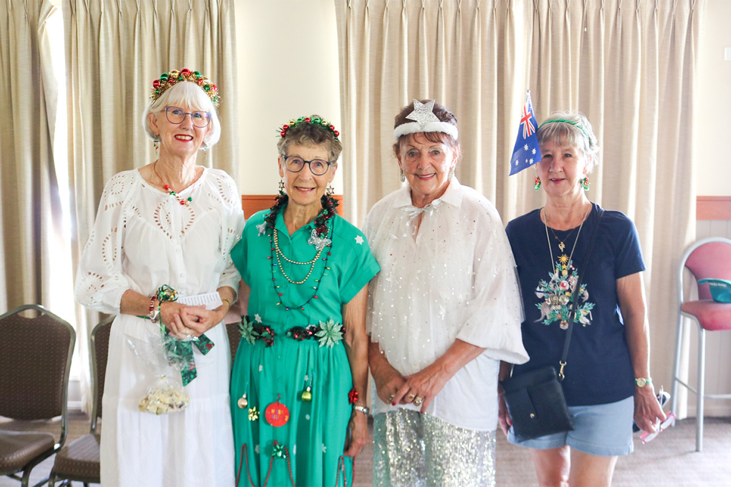 Dressed as Christmas Carols were Gail Eulenstein (I'm Dreaming of a White Christmas), Helen Meppen (O Christmas Tree), Valerie Hohn (Star of Bethlehem) and Linda Quinlan (Aussie Jingle Bells).