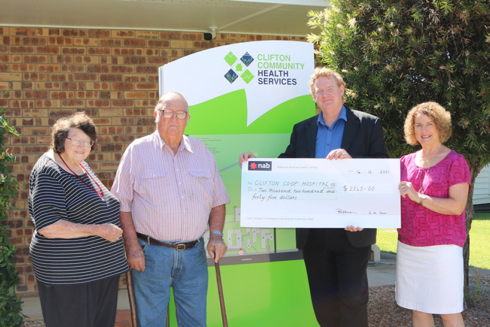 Clifton Jockey Club Publicity Officer Cynthia Conway (far left), President George Cross (centre left) and Treasurer Pauline Wilkinson (far right) presenting a cheque to Clifton Community Health Services General Manager Brad Jones.