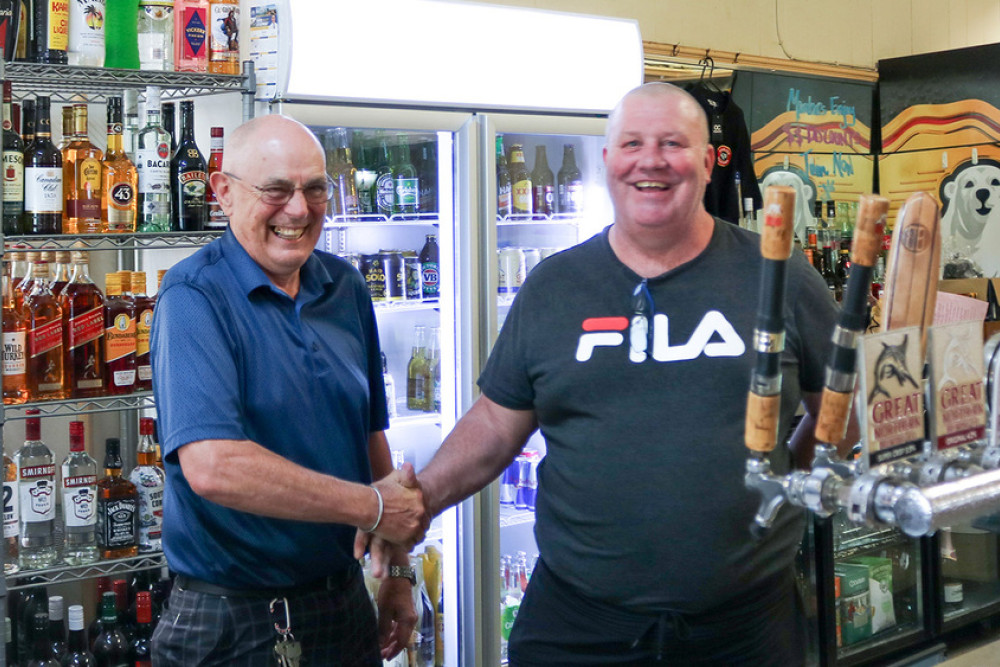 One half of the new ownership team, Andrew Ianson (right) was at the Club Hotel to take part in the handover from old owner Kevin Harman.