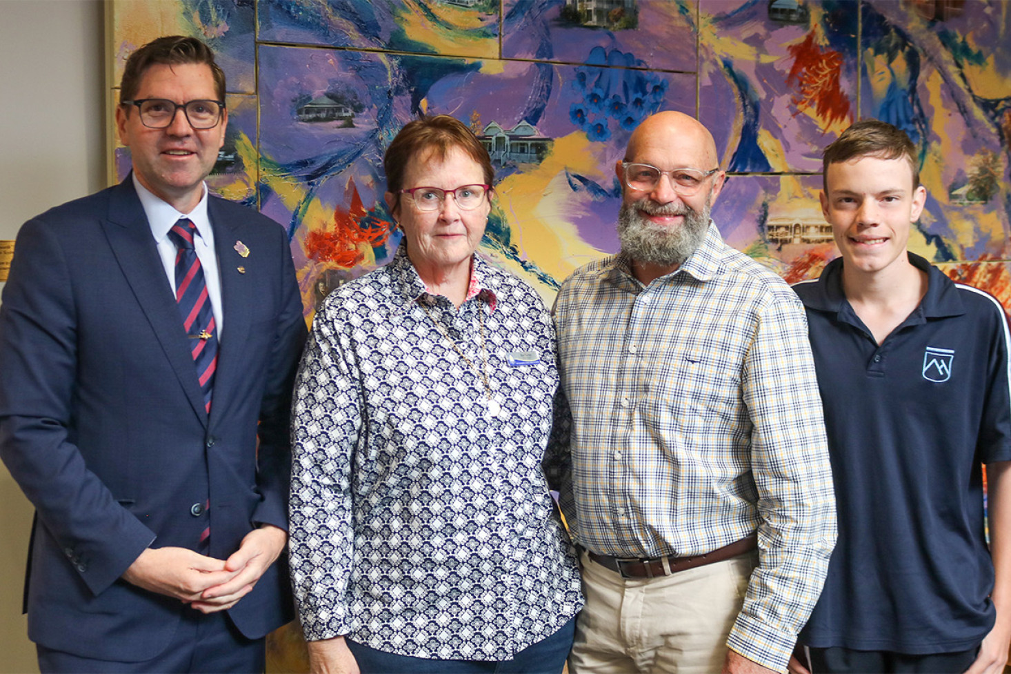 Toowoomba Region Mayor Geoff McDonald and Pittsworth State High School Chaplain Ros Turner with guest speaker of the 9th annual Mayoral Prayer Breakfast Colin Ryan and his son Elijah.