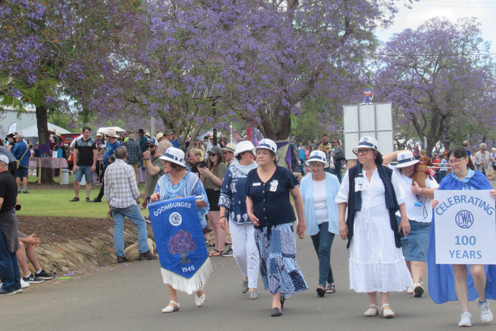 Members of the Goombungee branch of the Queensland Country Women’s Association (QCWA) play their part in Jacaranda Day every year, but in 2022 they added their own special celebration, with the Association marking its 100th year of service in Queensland.