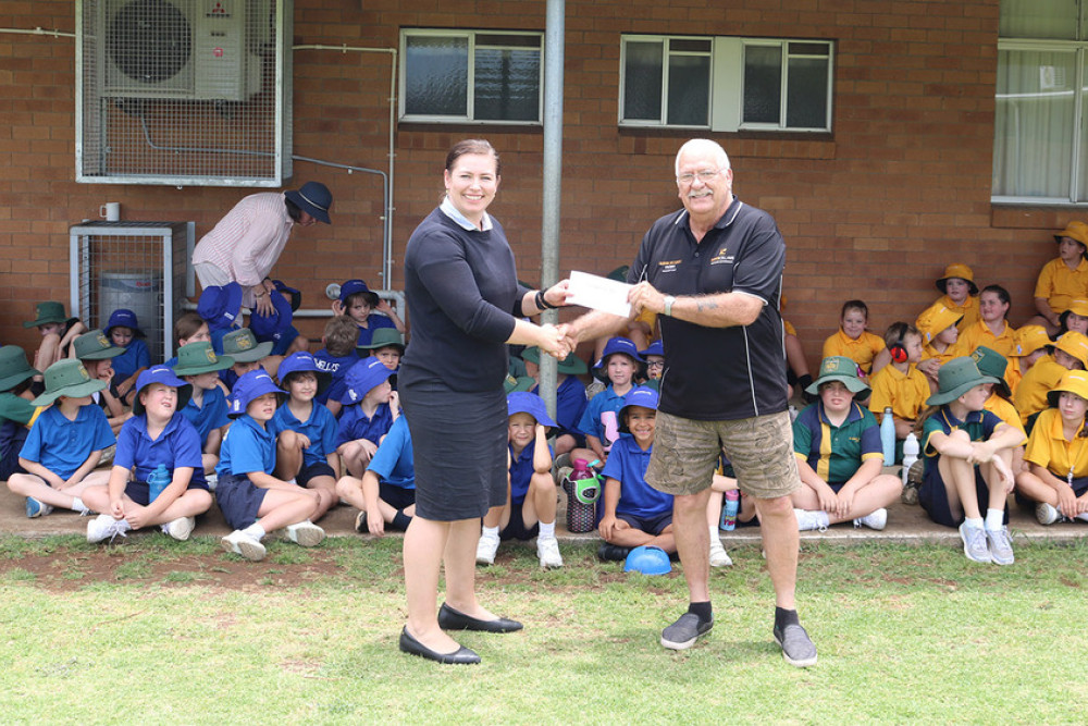 ABOVE: St Monica’s P&F chair Meg Bullock with Raffle Coordinator John Webster