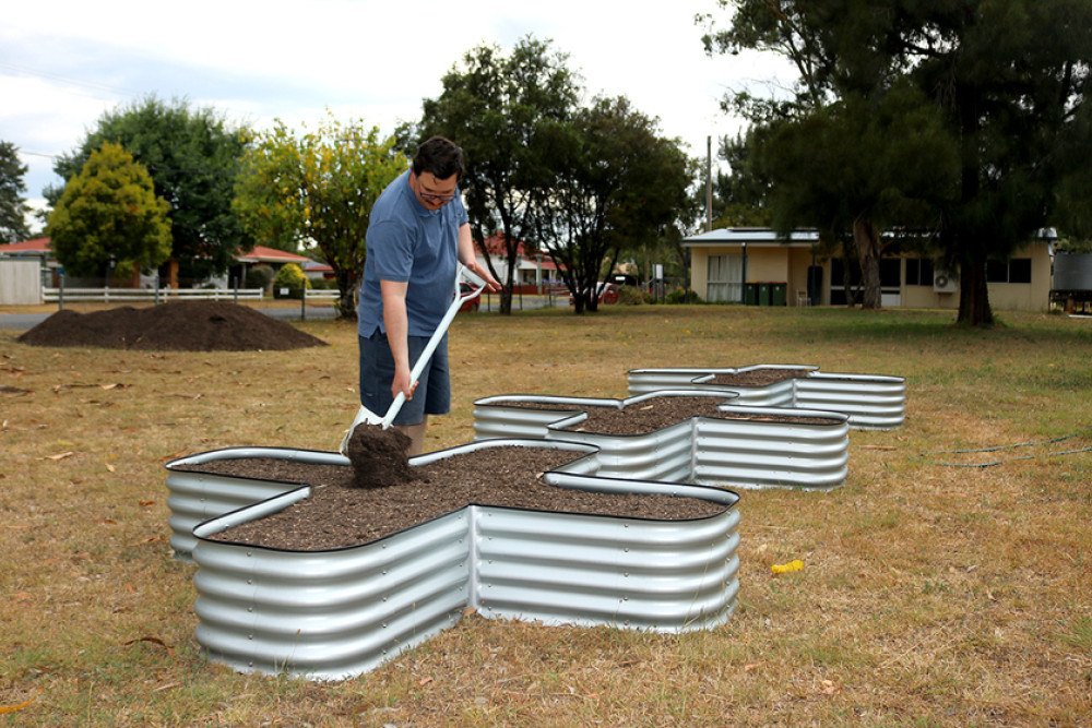 Ryan Barnes in Clifton’s new community garden.