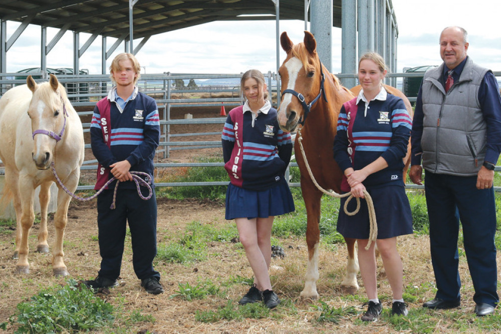 From left: School horse Malibu, ag students Zoe Hewett, Shanice Wilkinson and Tennah Conroy and Principal Lou Oberholzer. The area around where they are standing will be raised by 300mm when the new centre is built.