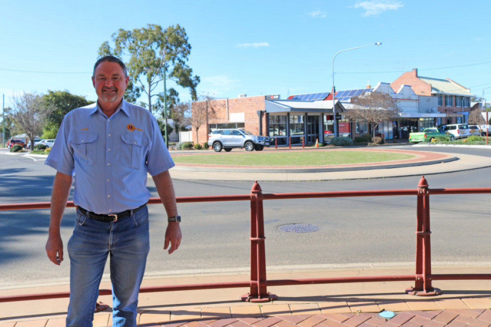 David Olischlager stands in front of the roundabout at the intersection of Yandilla and Short Streets where the proposed town clock would stand.