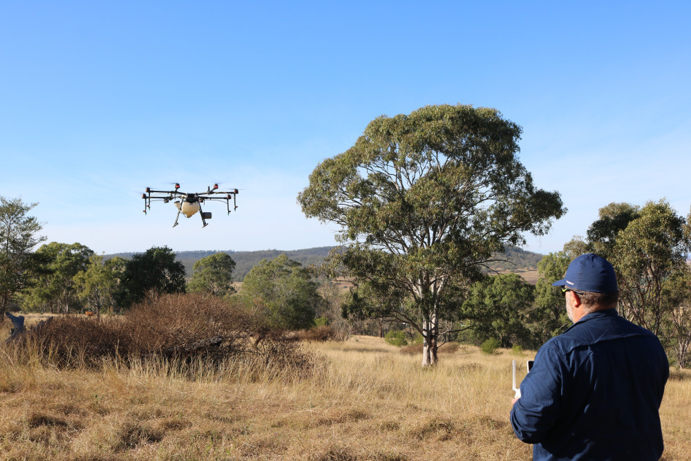 Drone Commander principal Roger Woods demonstrating one of the organisation’s agricultural drones, which are used for spraying and are not equipped with cameras.