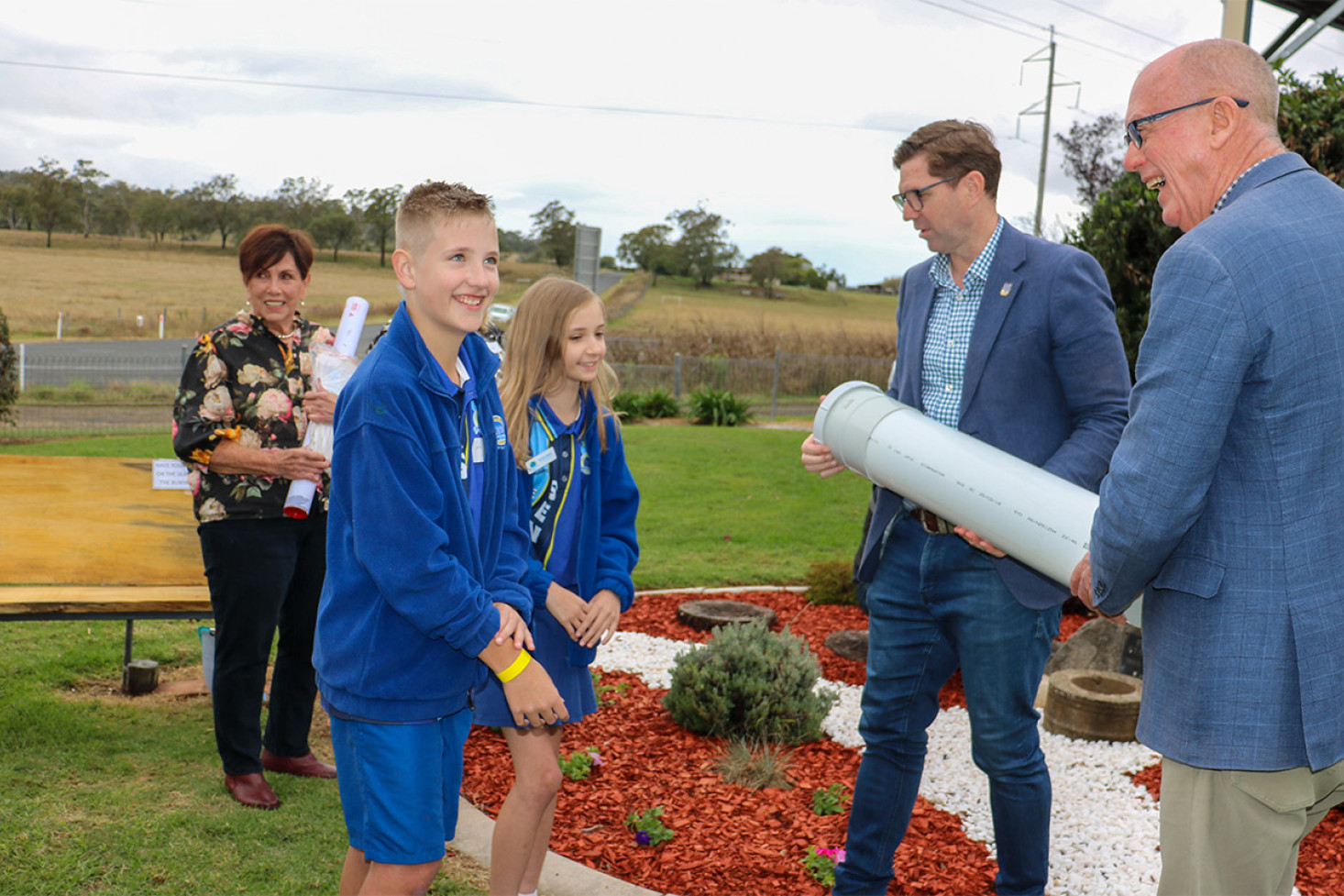 An important part of the day’s festivities was the opening of the old time capsule and burying of a new time capsule. From left: Toowoomba Region Councillor Carol Taylor, Emu Creek school leaders Carter Gittins and Mariah Baker, Toowoomba Region Mayor Geoff McDonald and Condamine MP Pat Weir.