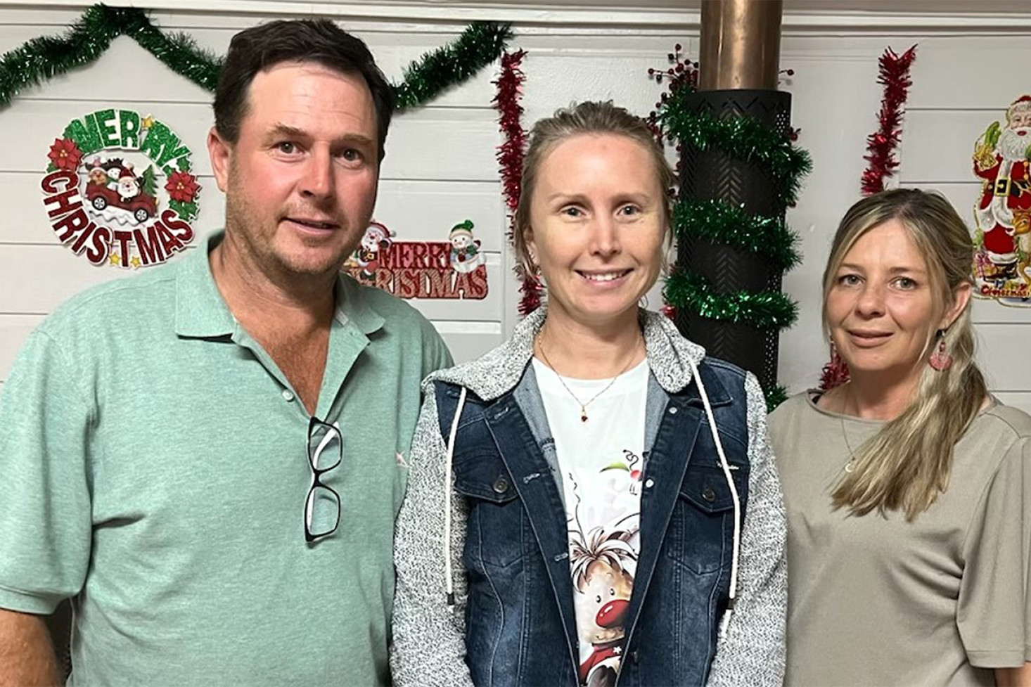 Wattles Junior Rugby League Club 2025 Season Executive Committee members - President Aaron Gilmore, Secretary Holly Death and Treasurer Vanessa Guy enjoying the festive celebrations at the club’s recent new season meet & greet function. (Image – by Allison May)