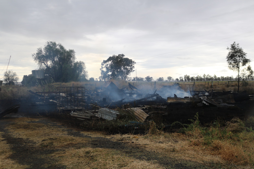 A pile of debris is all that remains of an Oakey house and shed destroyed by fire on Tuesday morning.