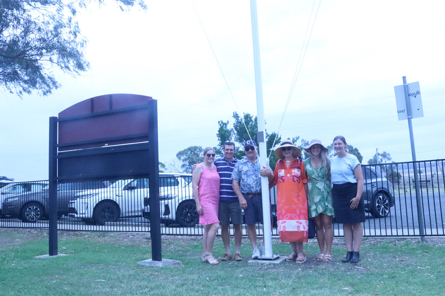 Andrew’s parents and siblings with his classmate and event organiser, Melody Labinsky.