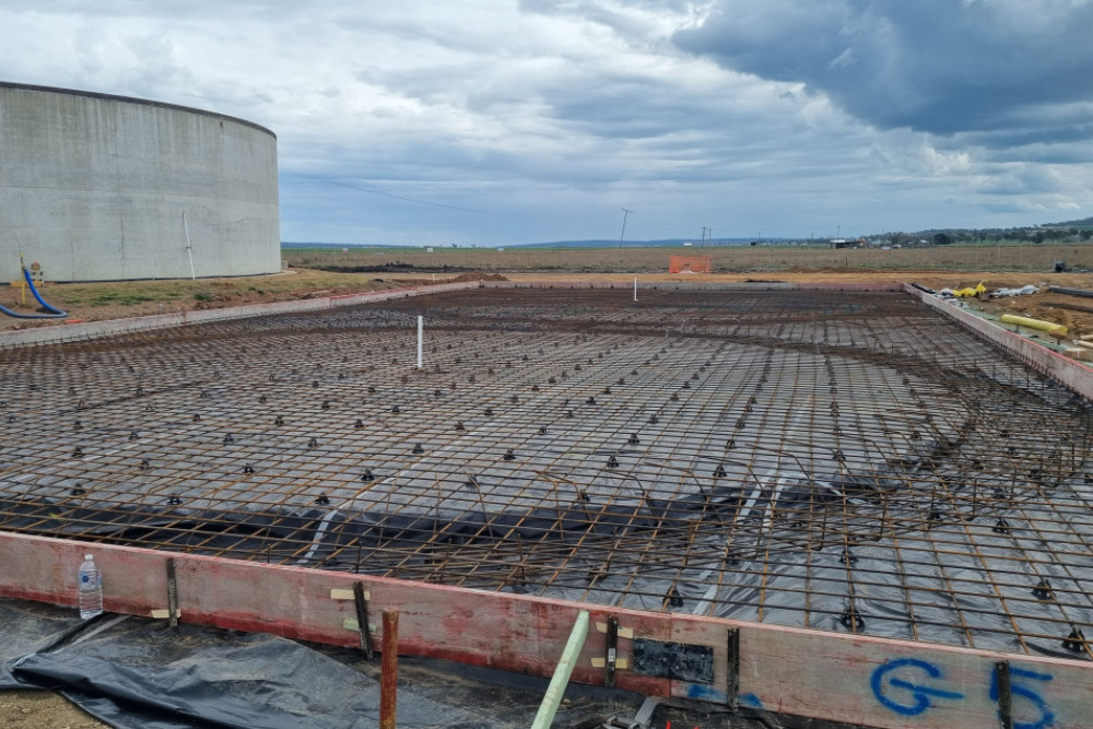 Work is underway constructing the Clifton Great Artesian Basin Bore site, including the tank bases.