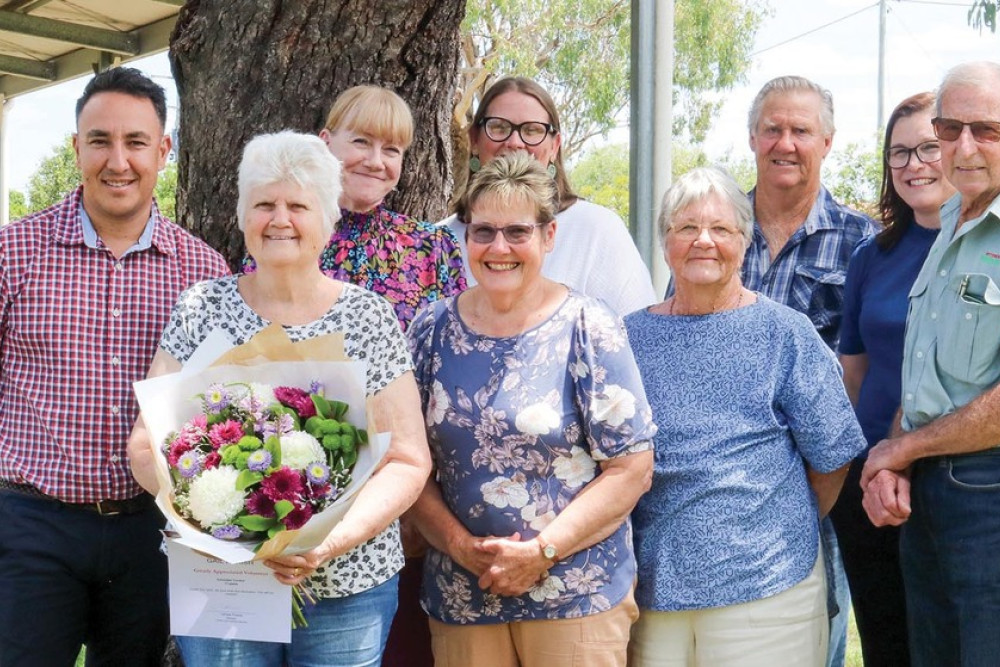 Gail Parish (pictured with the flowers), was farewelled by the Pioneer Village Advisory Committee on Monday, after 17 years as volunteer curator. Bidding her farewell are (from left) Councillor James O’Shea, Ann Batham (Toowoomba Regional Council), Ros Scotney, Amee Hetherington (Community Development Officer), Glynn Mace (History Pittsworth), Fred Reid (Pittsworth Woodcrafters), Tahnee Pearse (Toowoomba Regional Council) and Graham Cook (Pittsworth Men’s Shed).