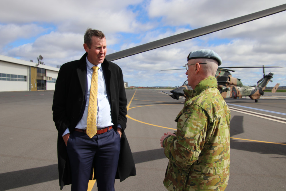 Member for Groom Garth Hamilton talks with Australian Army Aviation Training Centre Commandant Colonel Charlie Barton during a recent visit to the base.