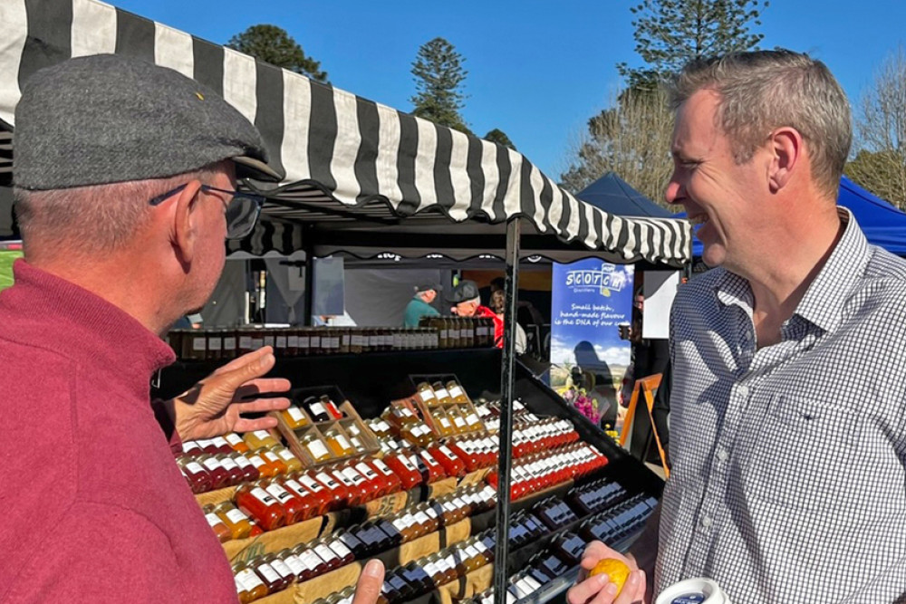 Groom MP Garth Hamilton sampling local products.