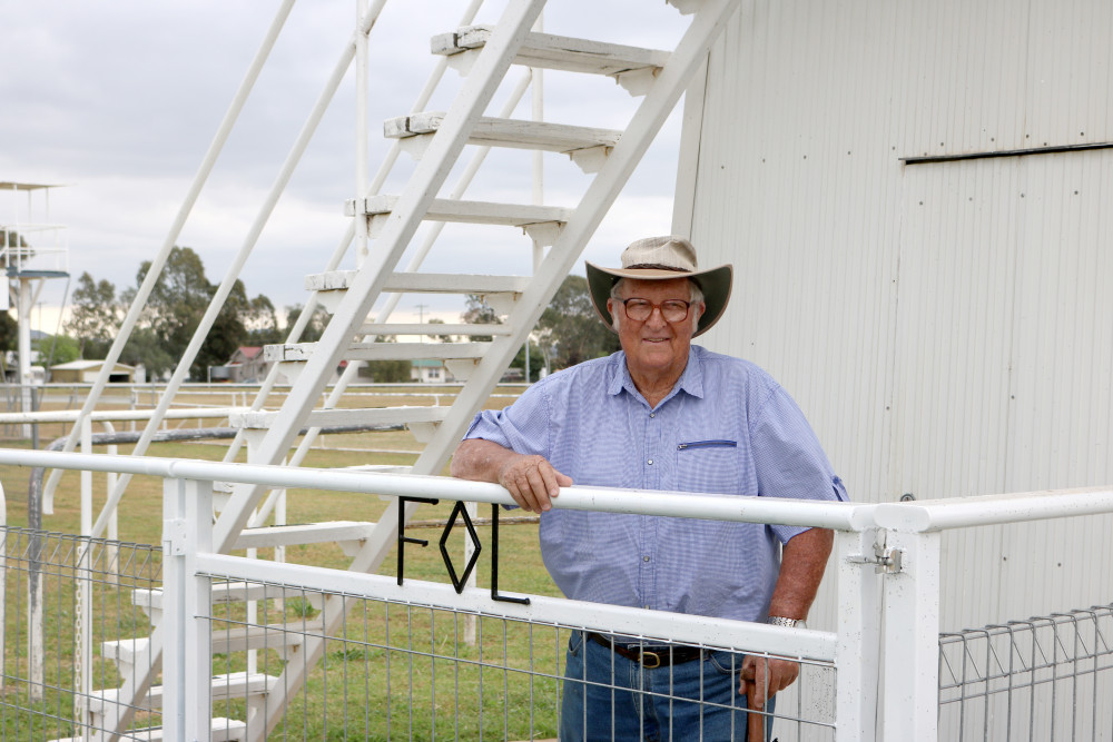 One of the upgrades for the Clifton Races is the new saddling paddock gate and fences, furnished by Frank E. Logan’s cattle brand, shown with Clifton Jockey Club President George Cross.