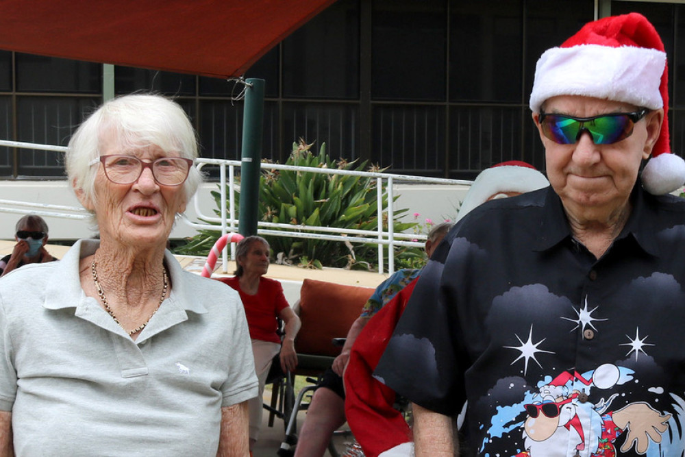 Residents and amateur musicians Gillian Whiting and Mick Haddy (with kazoo) pose for the camera.