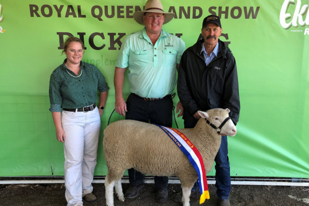 Grand Champion Ewe was exhibited by Chris Rubie from Sovereign Poll Dorset Stud near Warwick. L-R Sheep Judge Erin Lee, sponsor James Dickson from Dickson Ag and Chris Rubie.