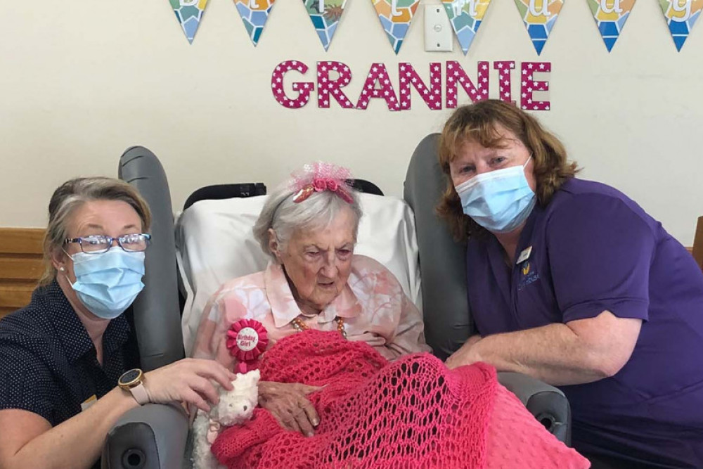 Granny Dorries (centre) celebrated her 106th birthday with McLean Care CWA House staff Di Bullen and Allyson Gardener.