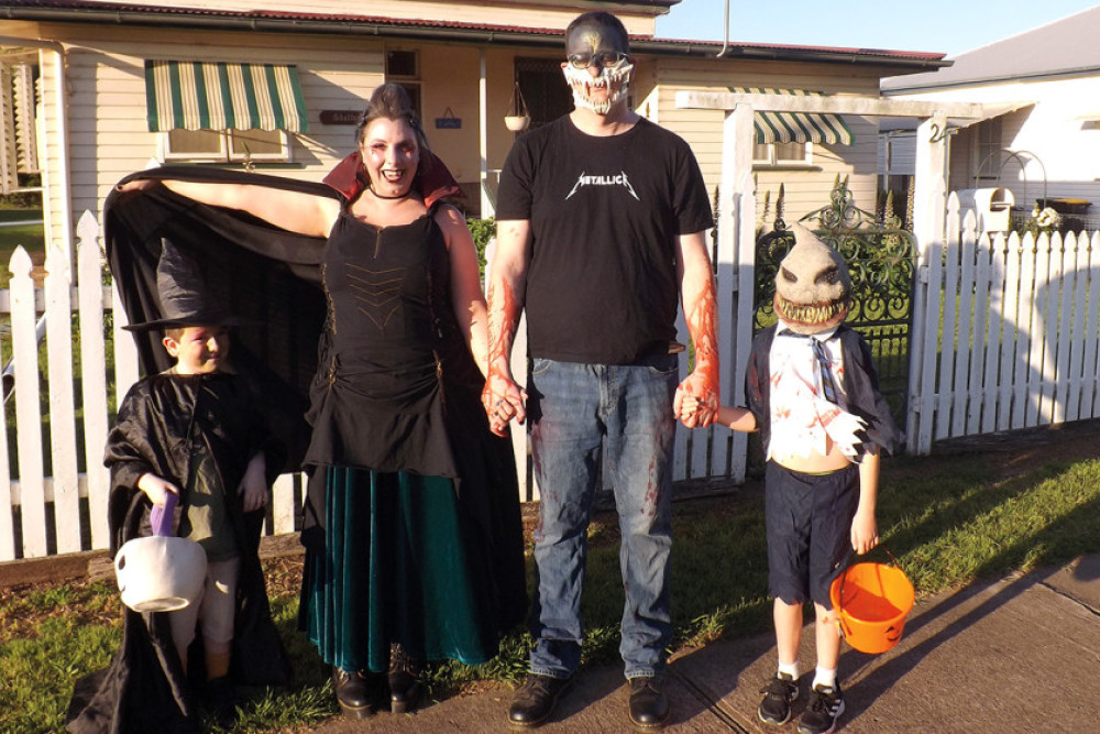 A family spotted in Drayton Street ready for trick-or-treat. (Seems that their trick was adding a new kid!)