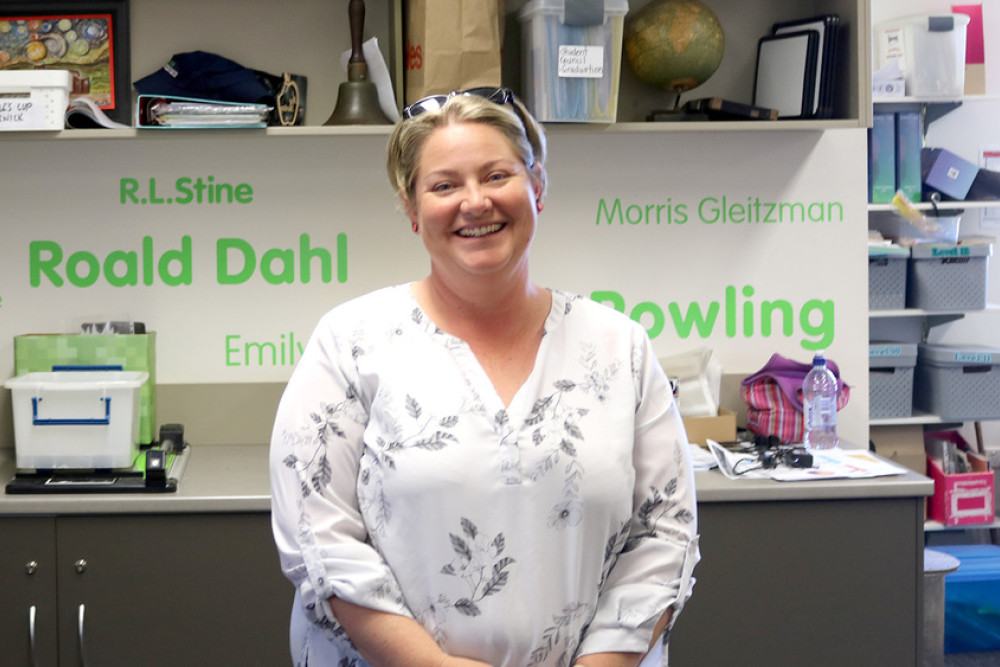 Helen Maddison in the library on her last day as a teacher aide at Clifton State School.