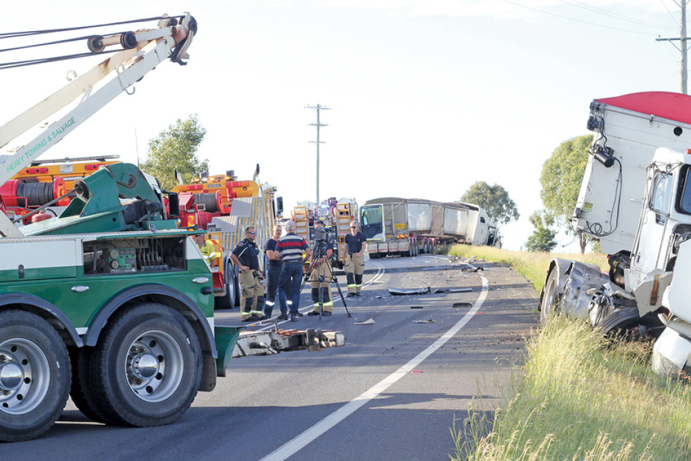 Debris was strewn across the highway after a collision between two trucks on Friday morning last week.