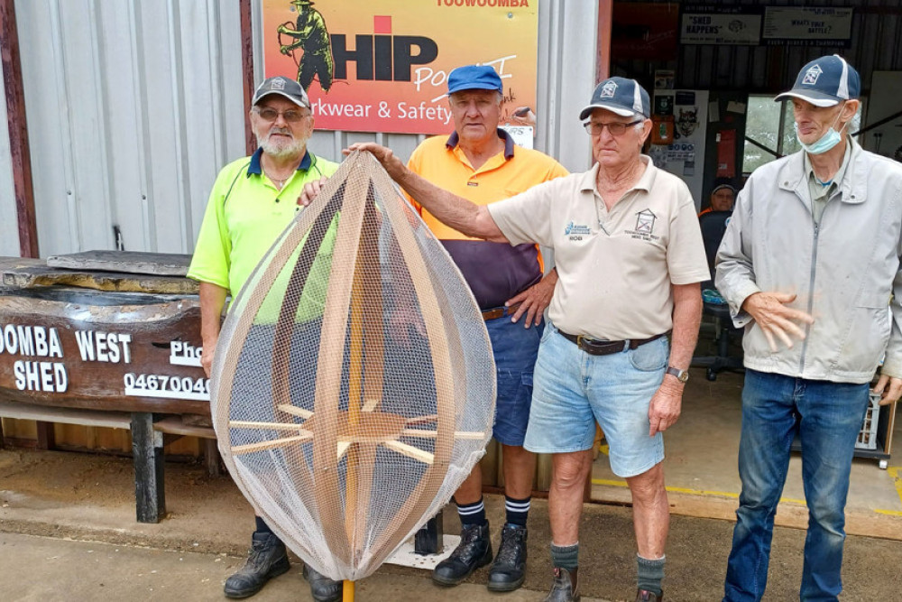 Members from the Toowoomba West Men’s Shed with the Tribute Tree.