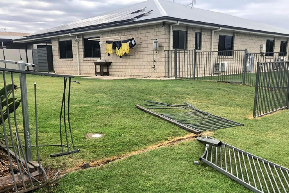 This house on Stanley Street in Pittsworth has received extensive damage to the fence after a car crashed into it before driving off in the early hours of New Years Day.