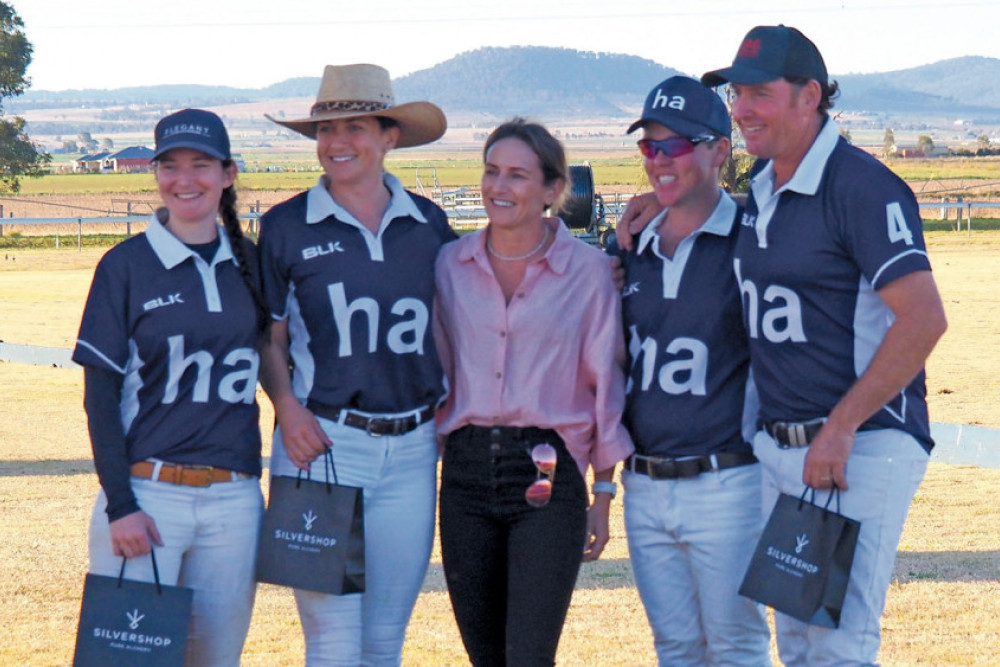 Members of the A Grade winning team, Kate Porteous, Leah Freney, Damian Allport and team captain Glen Gilmore with Belinda Grimes (centre) from the Silvershop, sponsor of the weekend carnival.