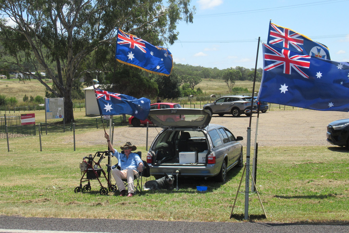 David “Spurs” Goodall showing his patriotism and receiving plenty of acknowledgement from motorists on the New England Highway.