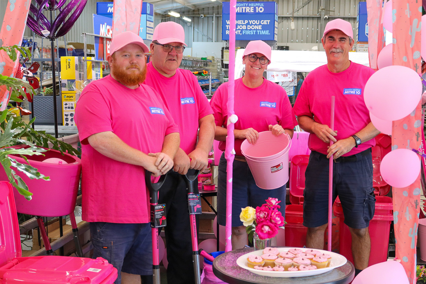 Members of the Raff team at Clifton are right into the pink theme - from t-shirts to gardening implements and even a tray of home made cupcakes! From left: Red Daley, Shane Mathies, Kate Flynn and Reg Abbott.