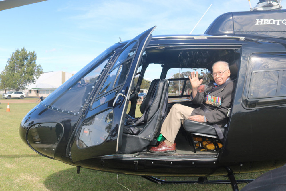 Clifton World War 2 veteran Joffre Bell, who is 102 years old today (27th April), settles into the Helitours chopper before heading to Southport via Greenmount.